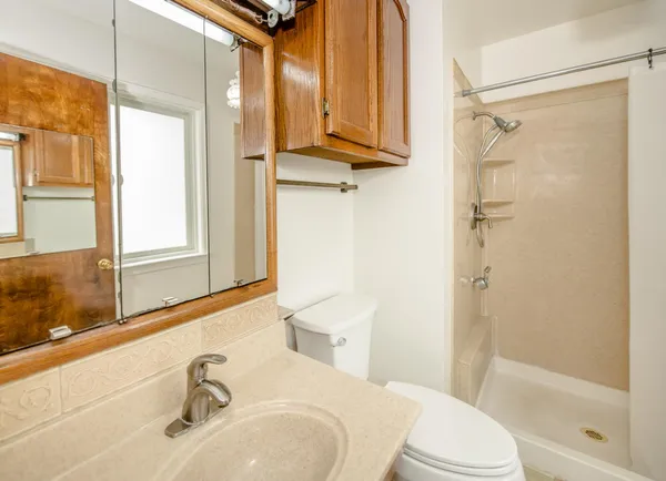 a view of a pathway with a yard