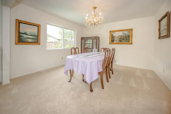 a view of a dining room with furniture