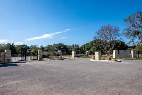 a view of a outdoor space with swimming pool