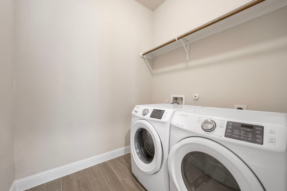 1601 Highland Ridge Road Georgetown, TX 78628 - Photo 19 of 37 a utility room with dryer and washer