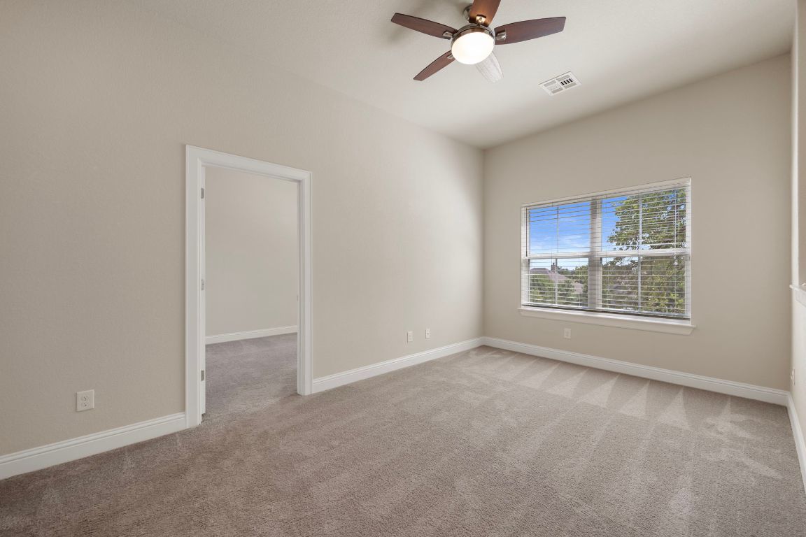 1601 Highland Ridge Road Georgetown, TX 78628 - Photo 25 of 37 a view of an empty room with a window