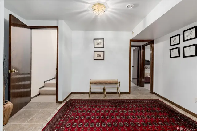 a bedroom with furniture and window