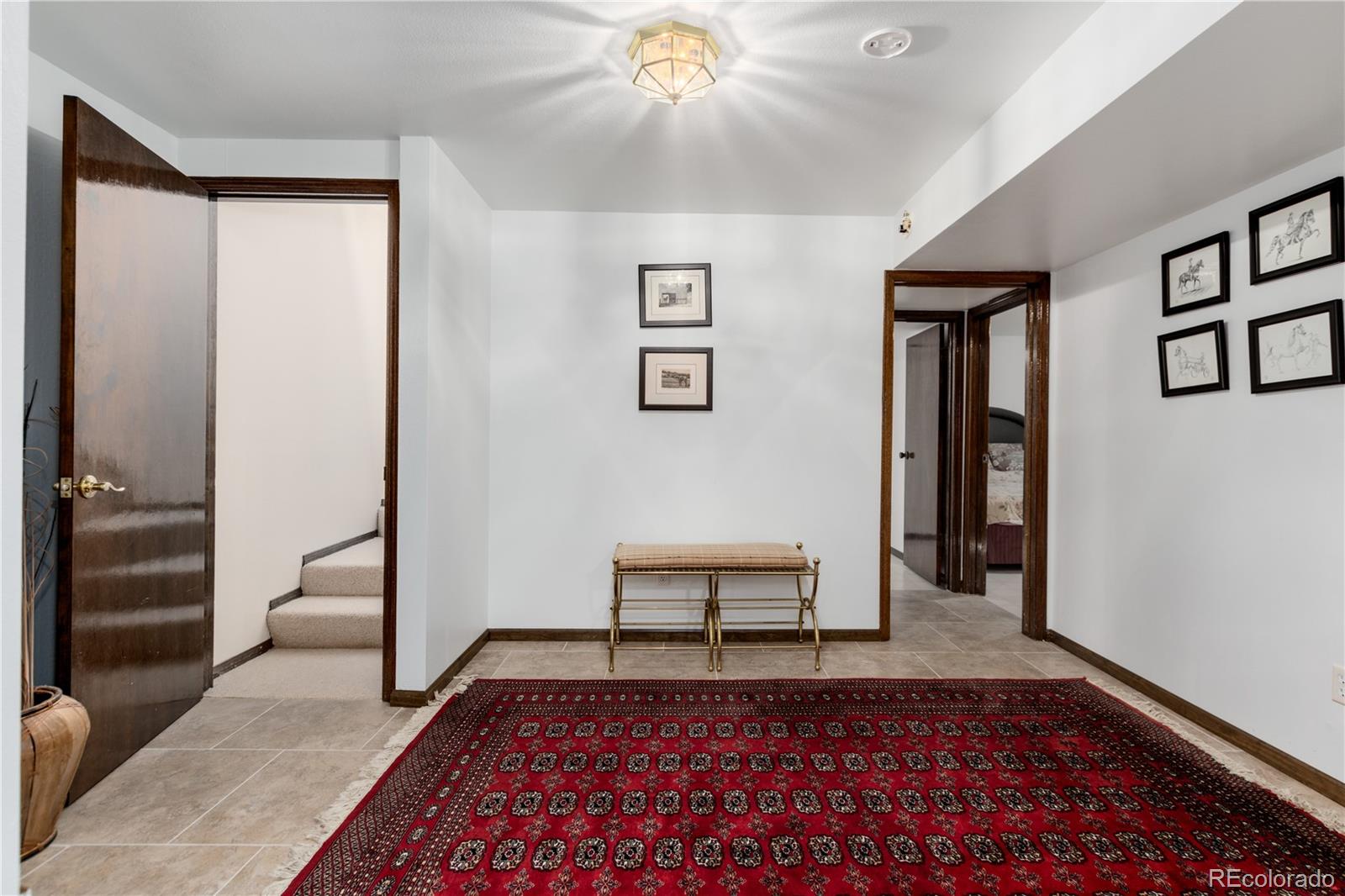 7846 North Village Road Parker, CO 80134 - Photo 32 of 50 a view of a hallway with interior of the house