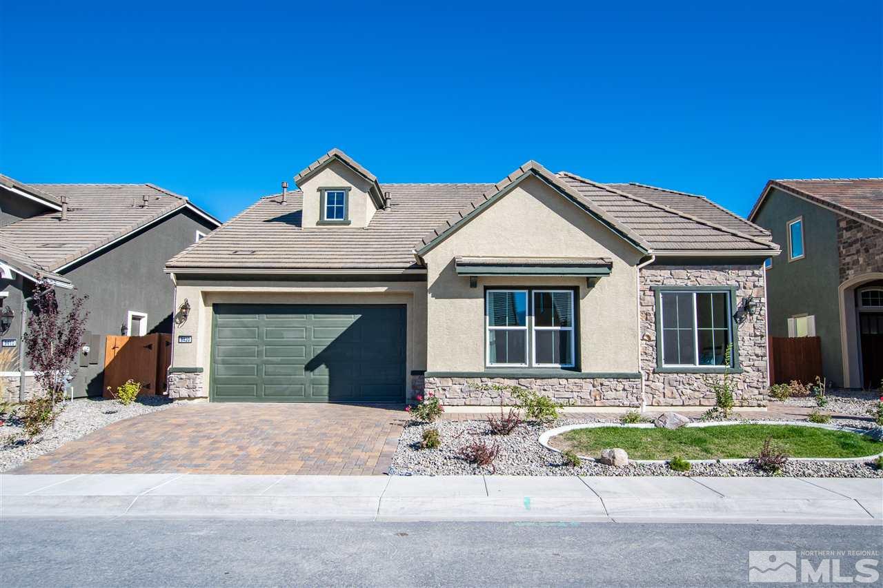 9420 Stony Hill Road, Unit LOT 52 Reno, NV 89521 - Photo 1 of 23 a front view of a house with a yard