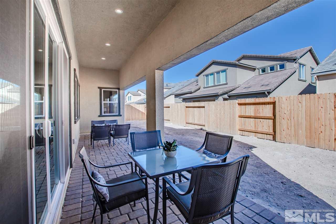 9420 Stony Hill Road, Unit LOT 52 Reno, NV 89521 - Photo 21 of 23 a dining room with furniture and window