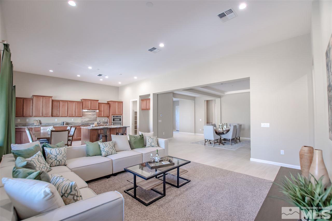 9420 Stony Hill Road, Unit LOT 52 Reno, NV 89521 - Photo 4 of 23 a living room with furniture and a table