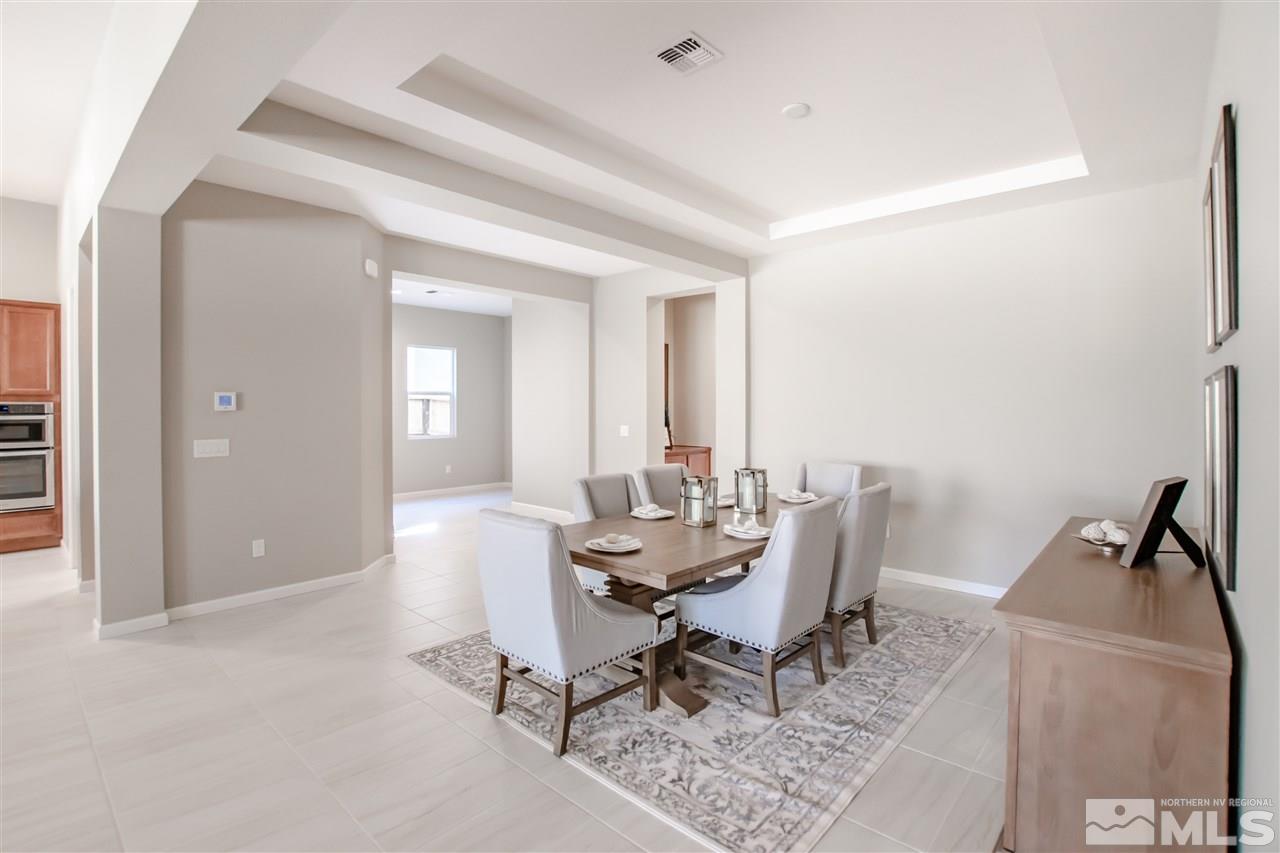 9420 Stony Hill Road, Unit LOT 52 Reno, NV 89521 - Photo 10 of 23 a view of a dining room with furniture