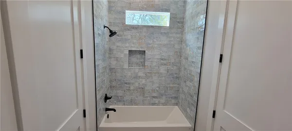 a bathroom with a bathtub