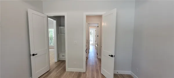 a view of a bathroom from the hallway