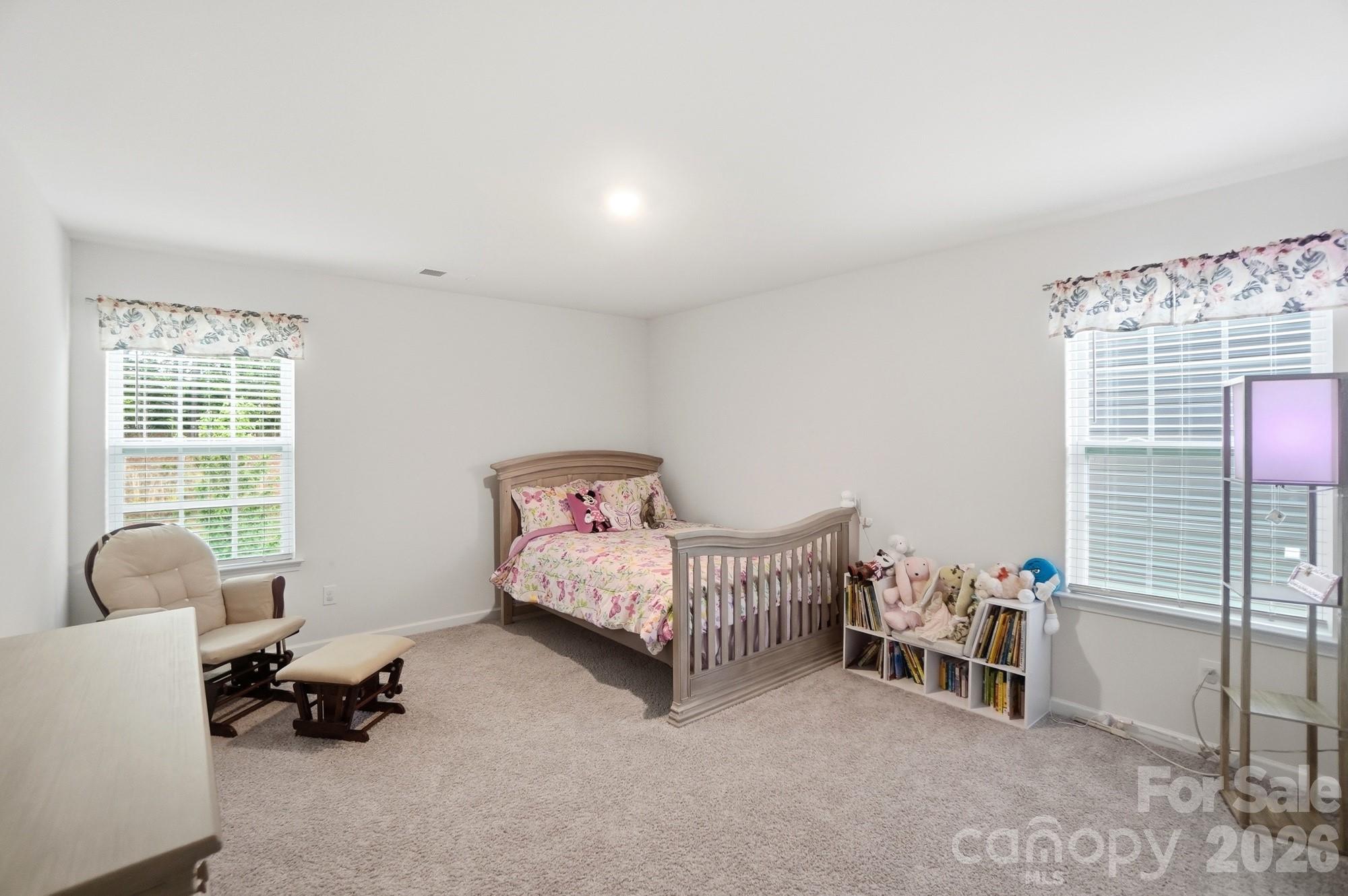 116 Timbergreen Court Troutman, NC 28166 - Photo 30 of 43 a bedroom with furniture and a window