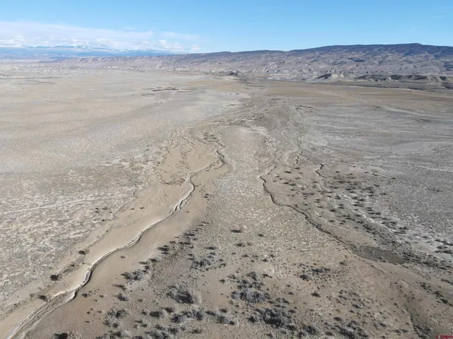 a view of beach and mountain