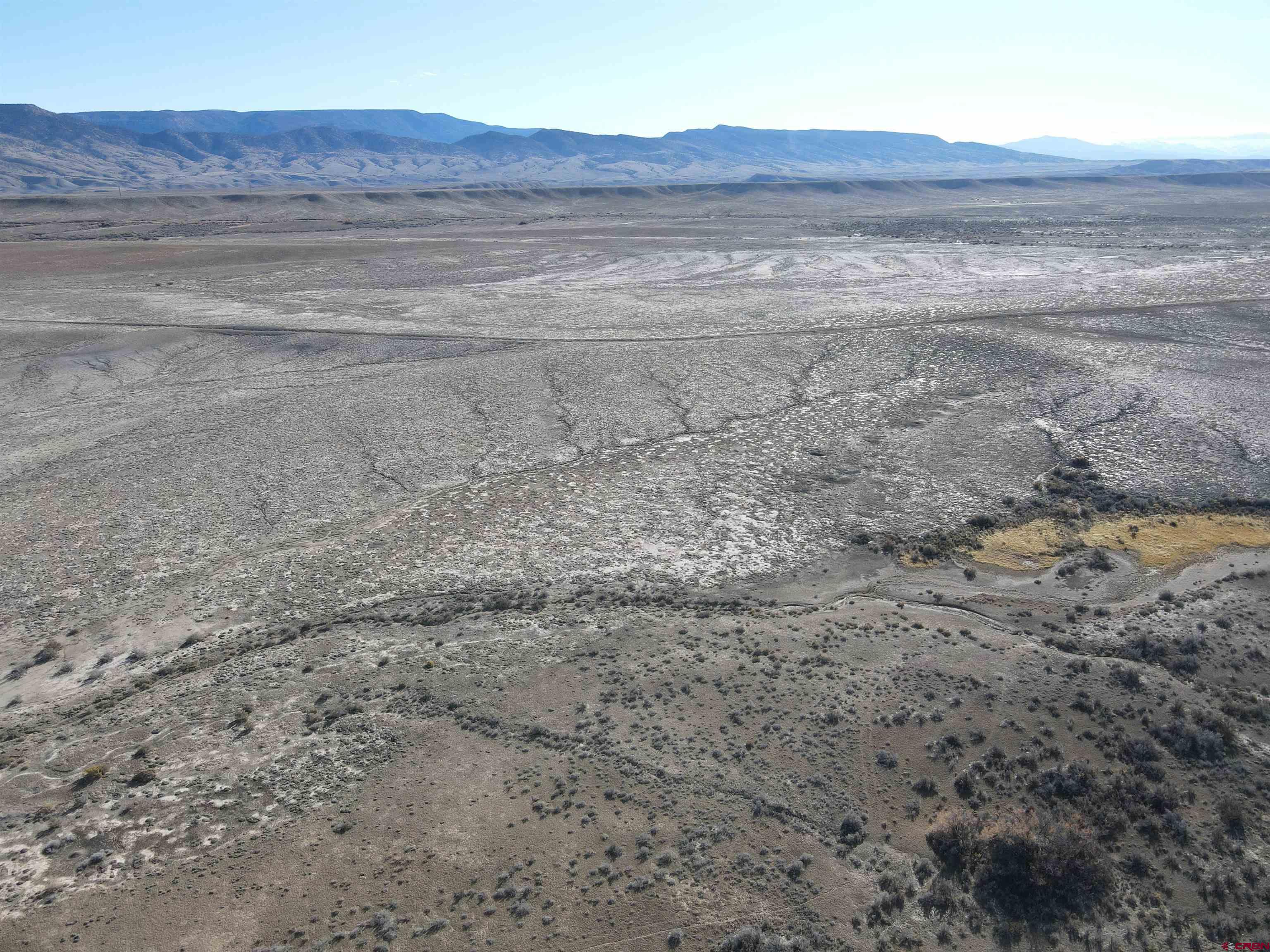 Tbd Tbd Tbd Delta, CO 81416 - Photo 6 of 16 a view of a dry yard with wooden floor and fence