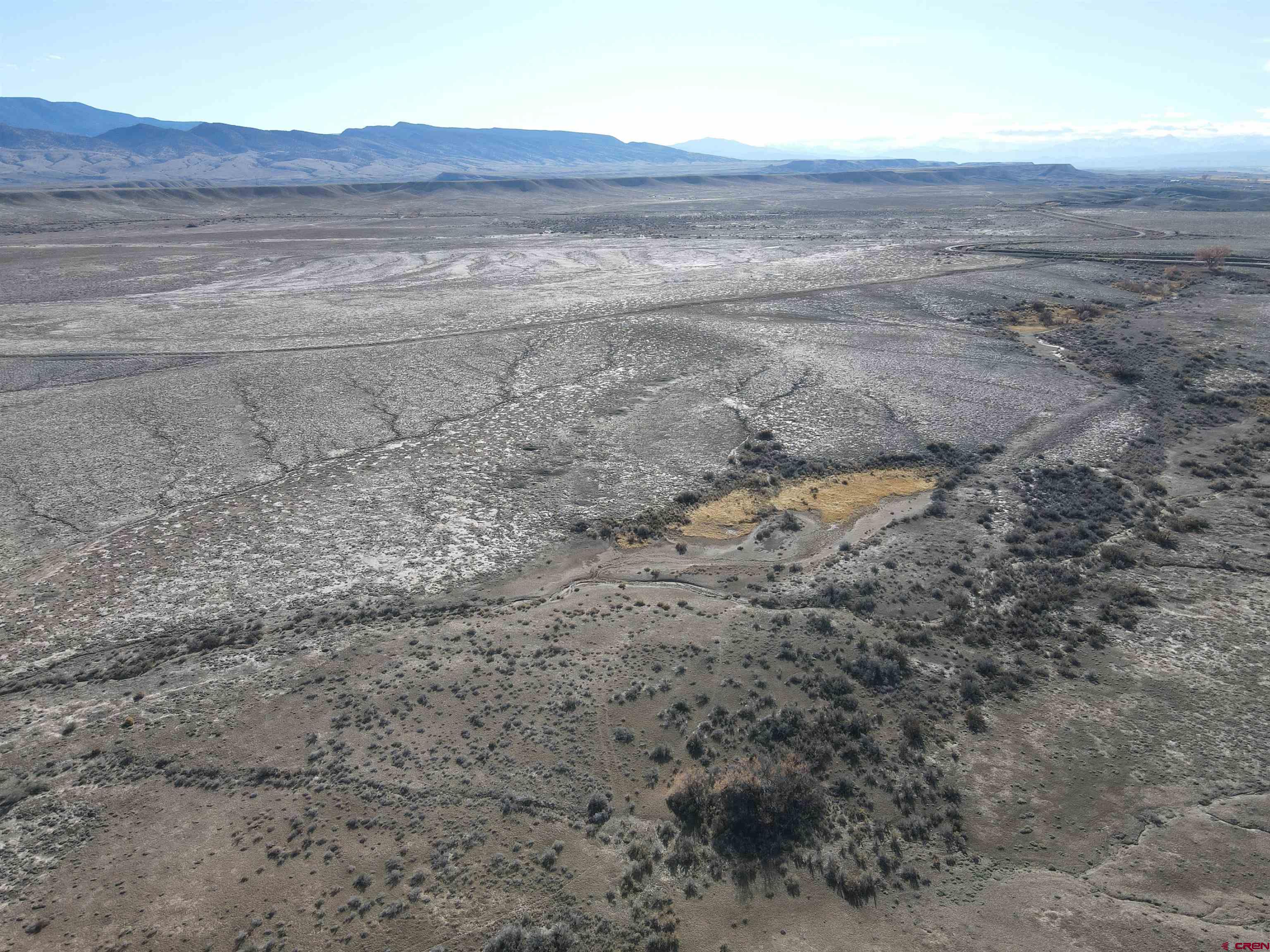 Tbd Tbd Tbd Delta, CO 81416 - Photo 7 of 16 a view of a dry yard with wooden floor and fence