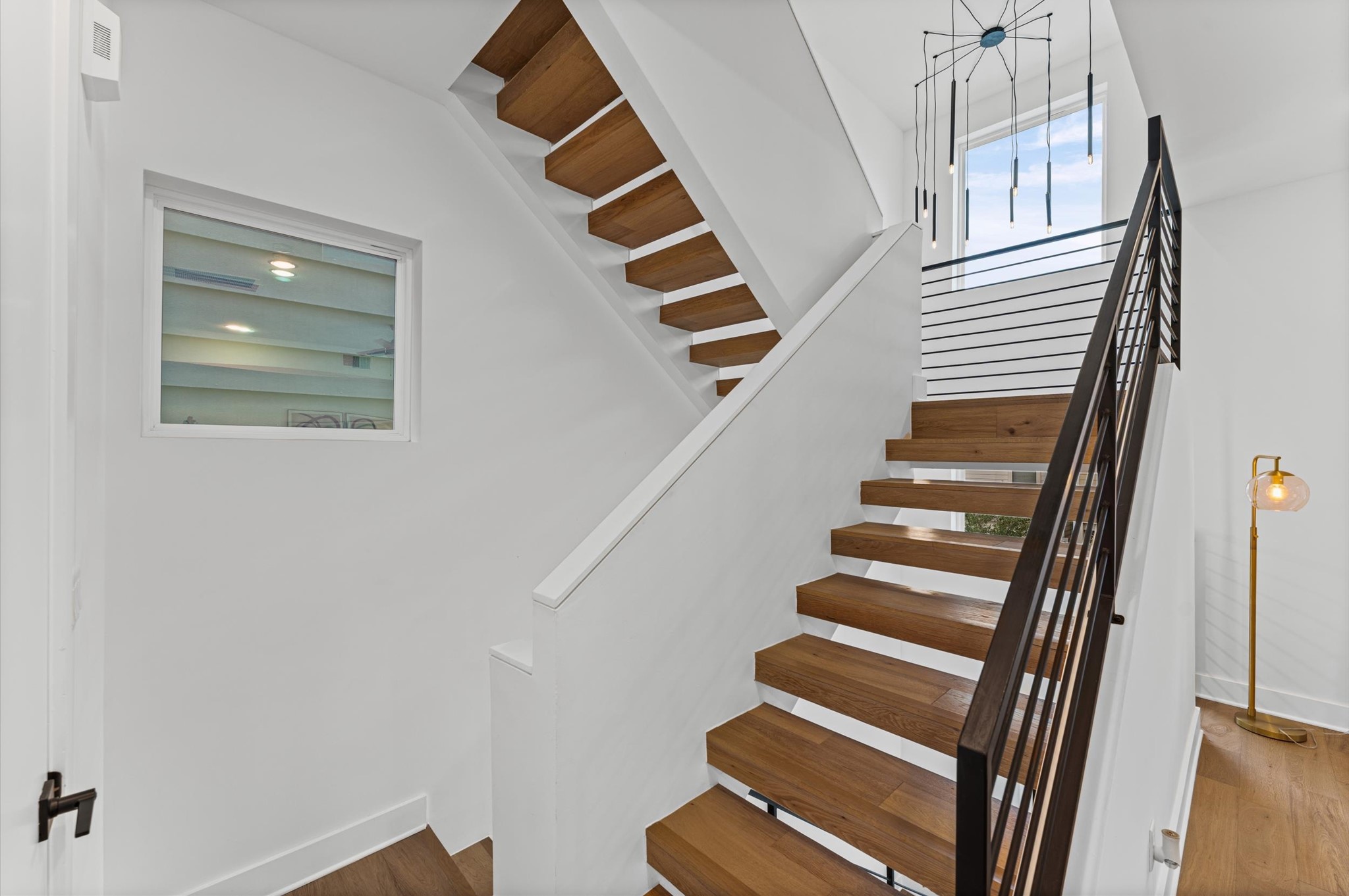 1404 Bailey Street Houston, TX 77019 - Photo 15 of 25 a view of entryway with wooden floor