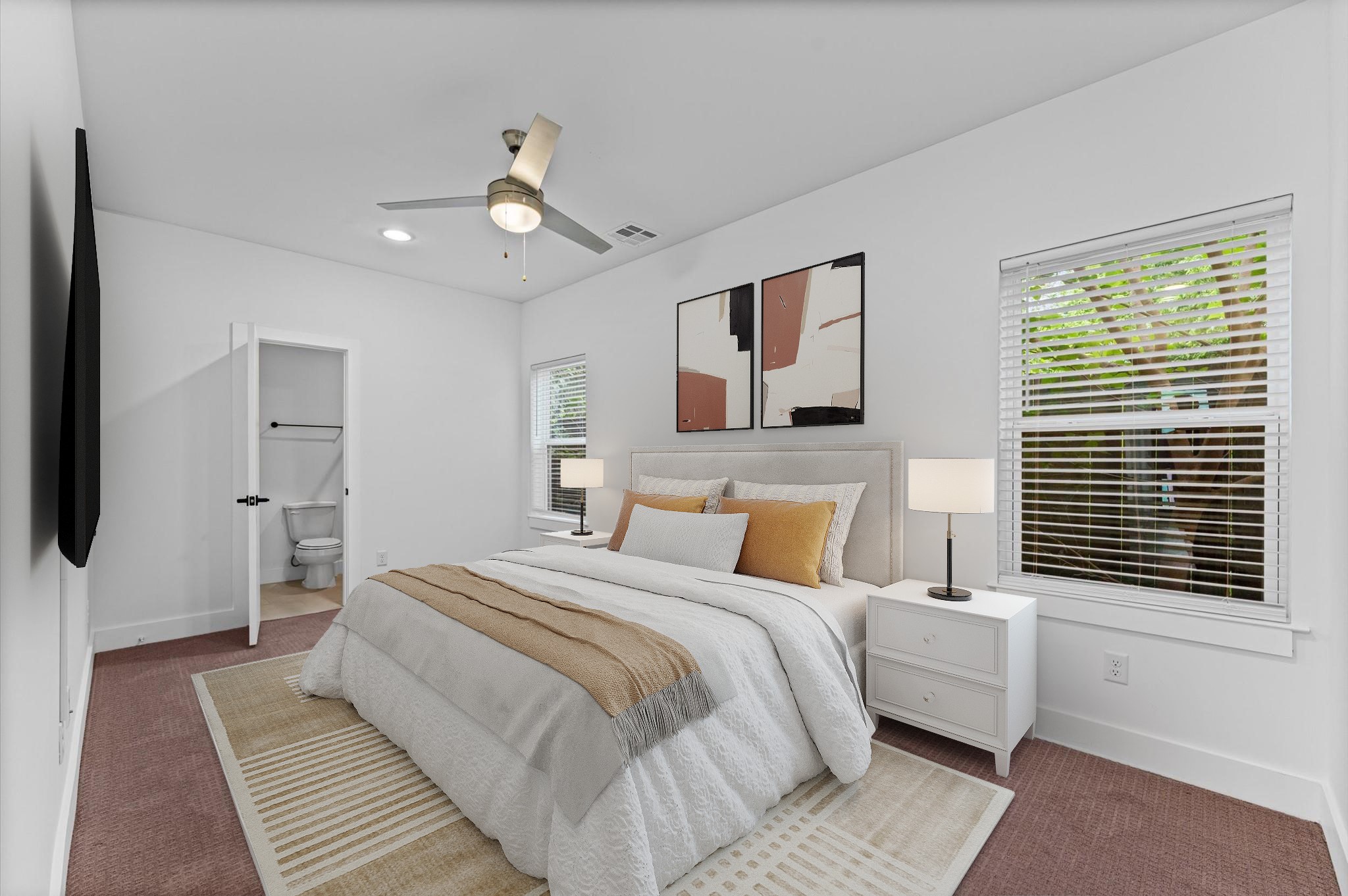 1404 Bailey Street Houston, TX 77019 - Photo 5 of 25 a bedroom with a large bed and a chandelier