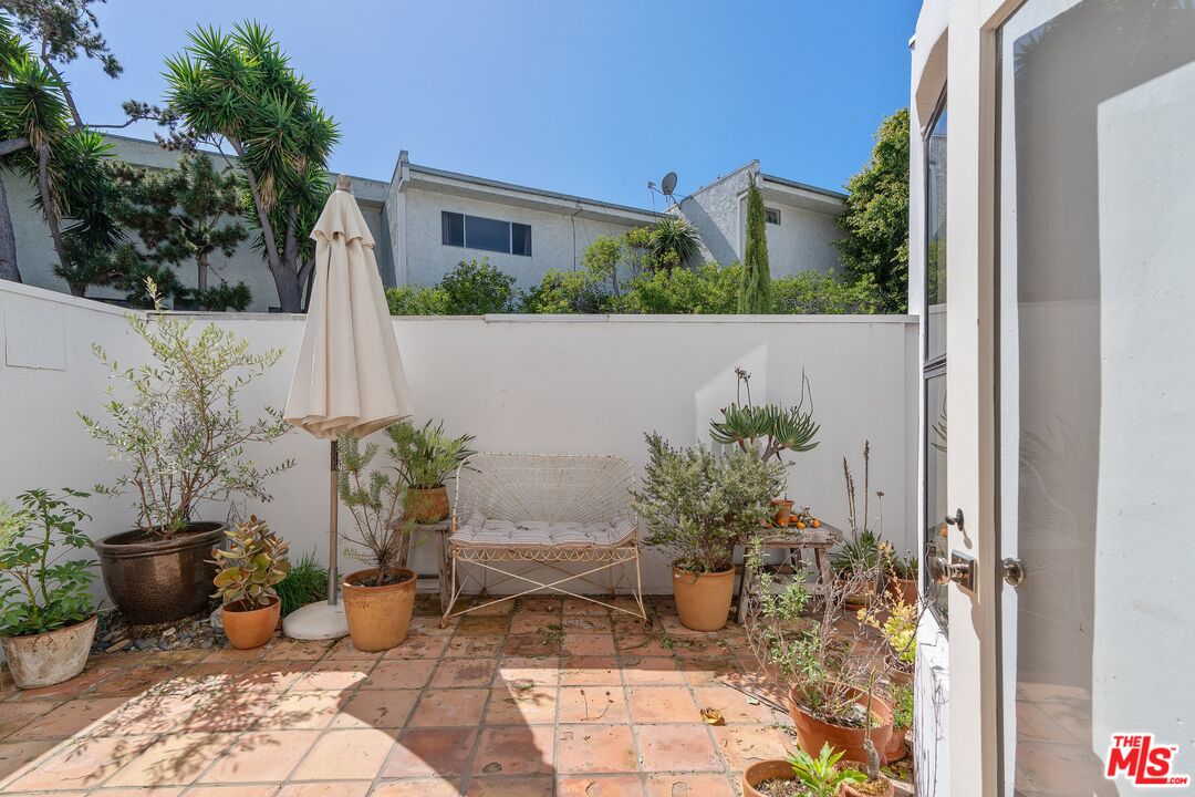 29221 Heathercliff Road, Unit 2 Malibu, CA 90265 - Photo 17 of 19 a view of a backyard with sitting area
