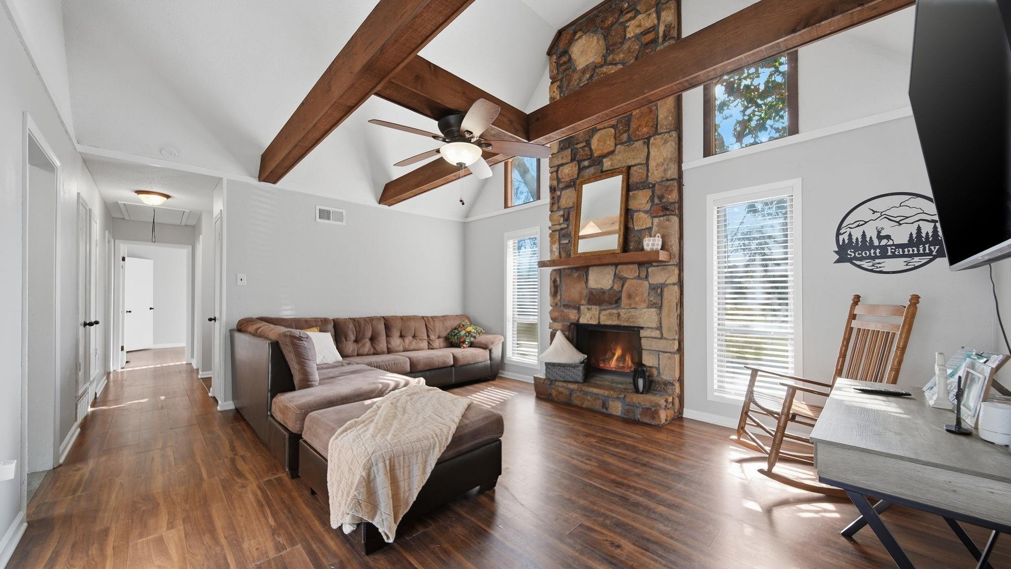 4182 Luther Road Memphis, TN 38135 - Photo 13 of 40 a living room with fireplace furniture and a wooden floor