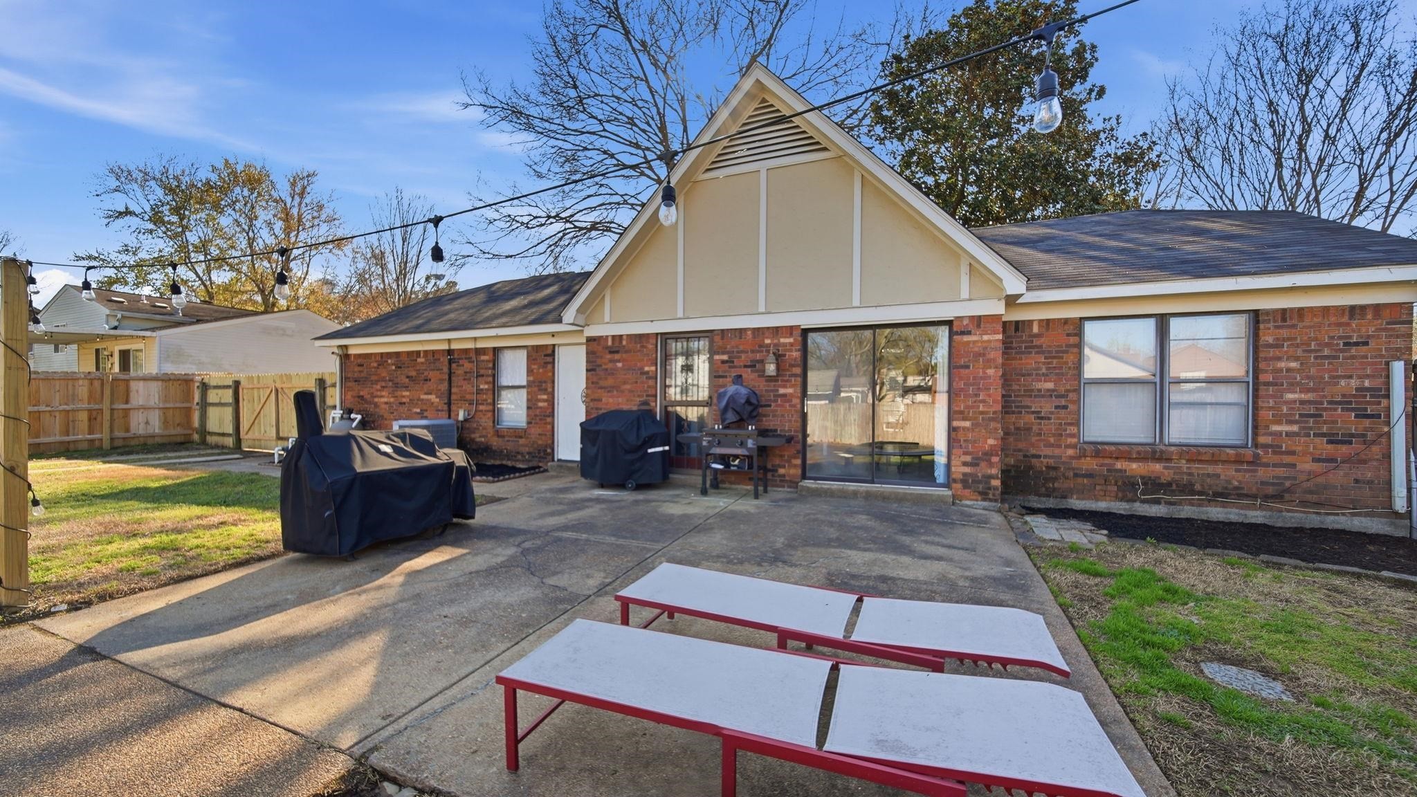 4182 Luther Road Memphis, TN 38135 - Photo 34 of 40 a view of a house with backyard porch and sitting area