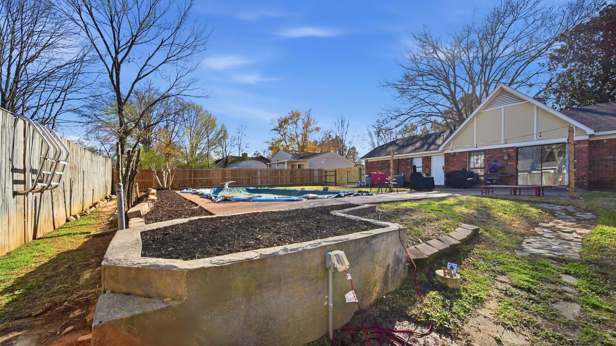 4182 Luther Road Memphis, TN 38135 - Photo 37 of 40 a view of house with outdoor space