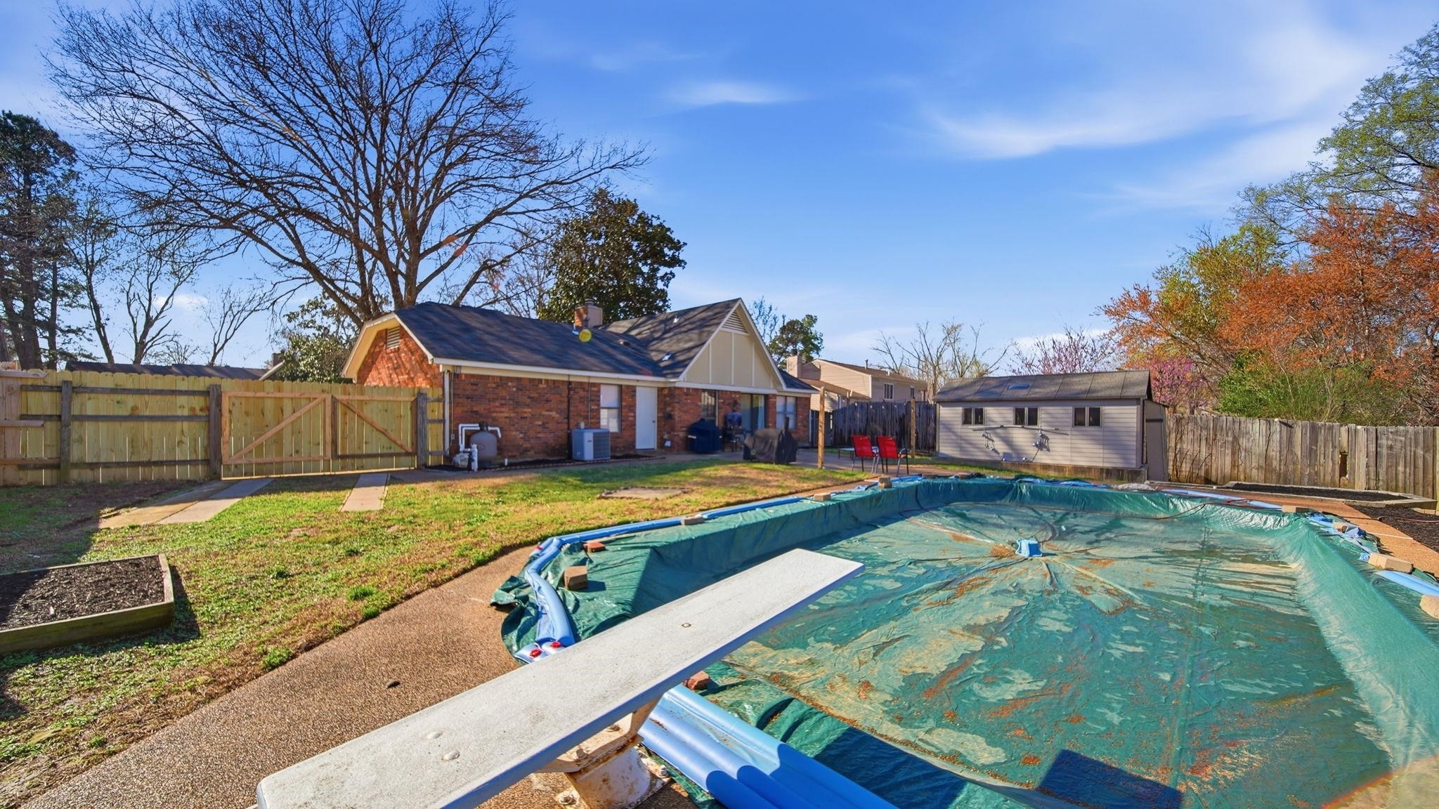 4182 Luther Road Memphis, TN 38135 - Photo 38 of 40 a view of an house with backyard space and balcony