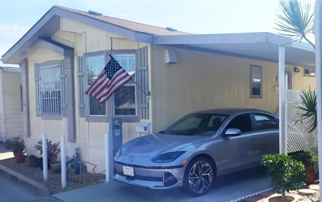 a car parked in front of a house