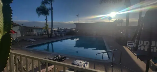 a view of a porch with wooden floor