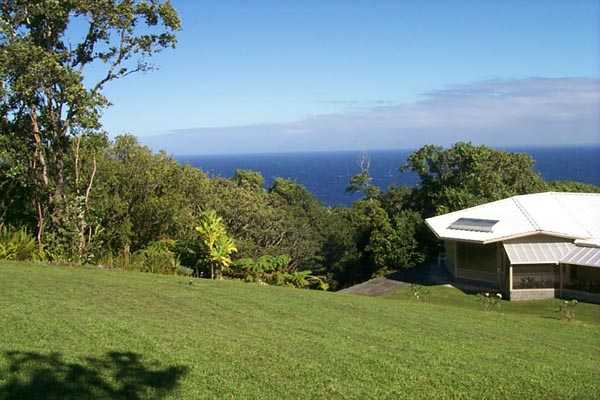 Private Road Ninole, HI 96773 - Photo 3 of 6 a view of a table and chairs in the yard