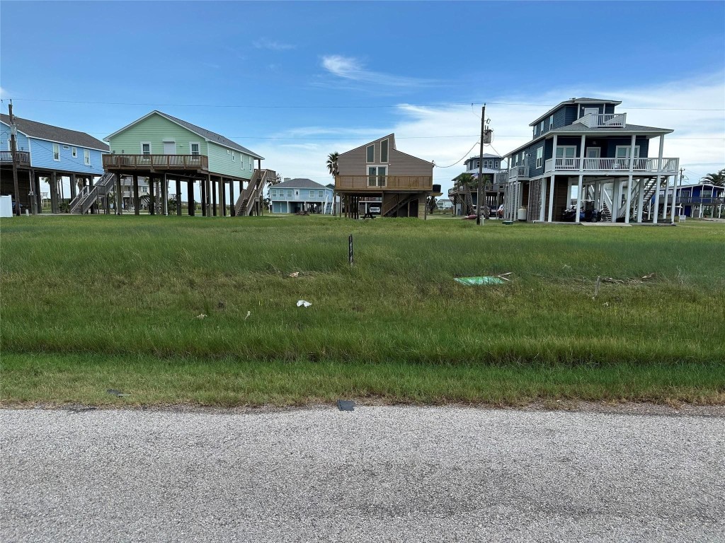 0 Fathom Drive Freeport, TX 77541 - Photo 4 of 6 a front view of a house with garden