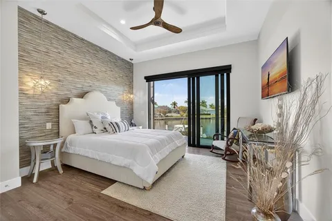 a bathroom with a sink a mirror and a shower