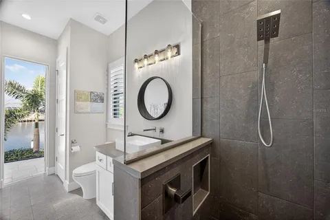 a view of living room kitchen and entryway