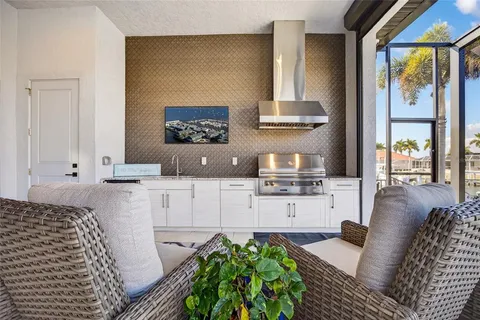a stove top oven sitting inside of a kitchen