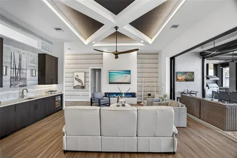 a spacious bathroom with a double vanity sink a mirror and a bathtub