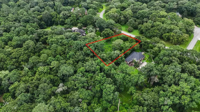 an aerial view of residential house with outdoor space and street view