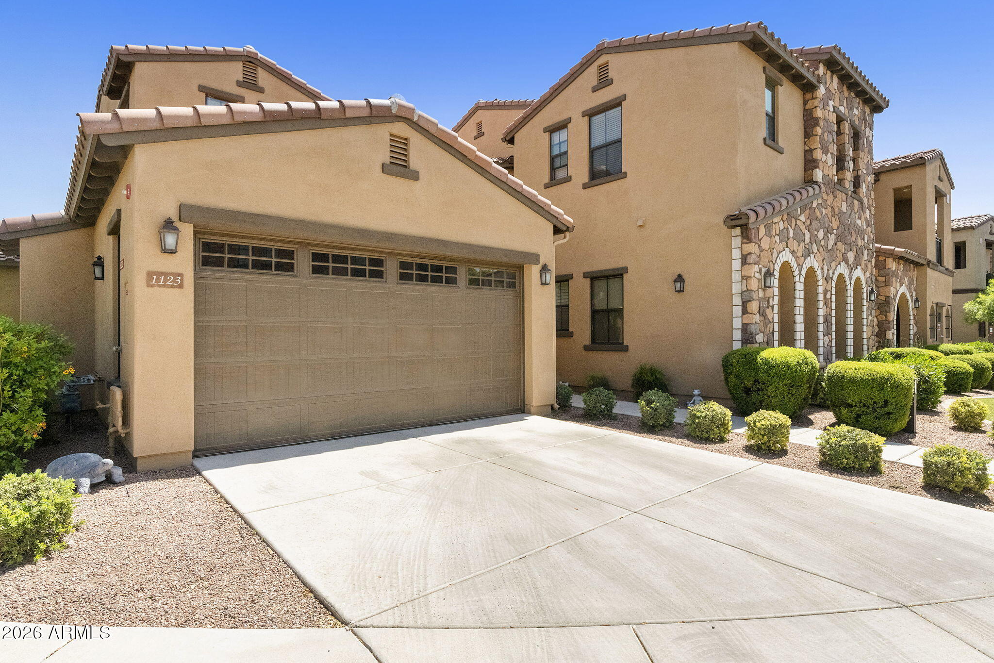4777 South Fulton Ranch Boulevard, Unit 1123 Chandler, AZ 85248 - Photo 11 of 18 a front view of a house