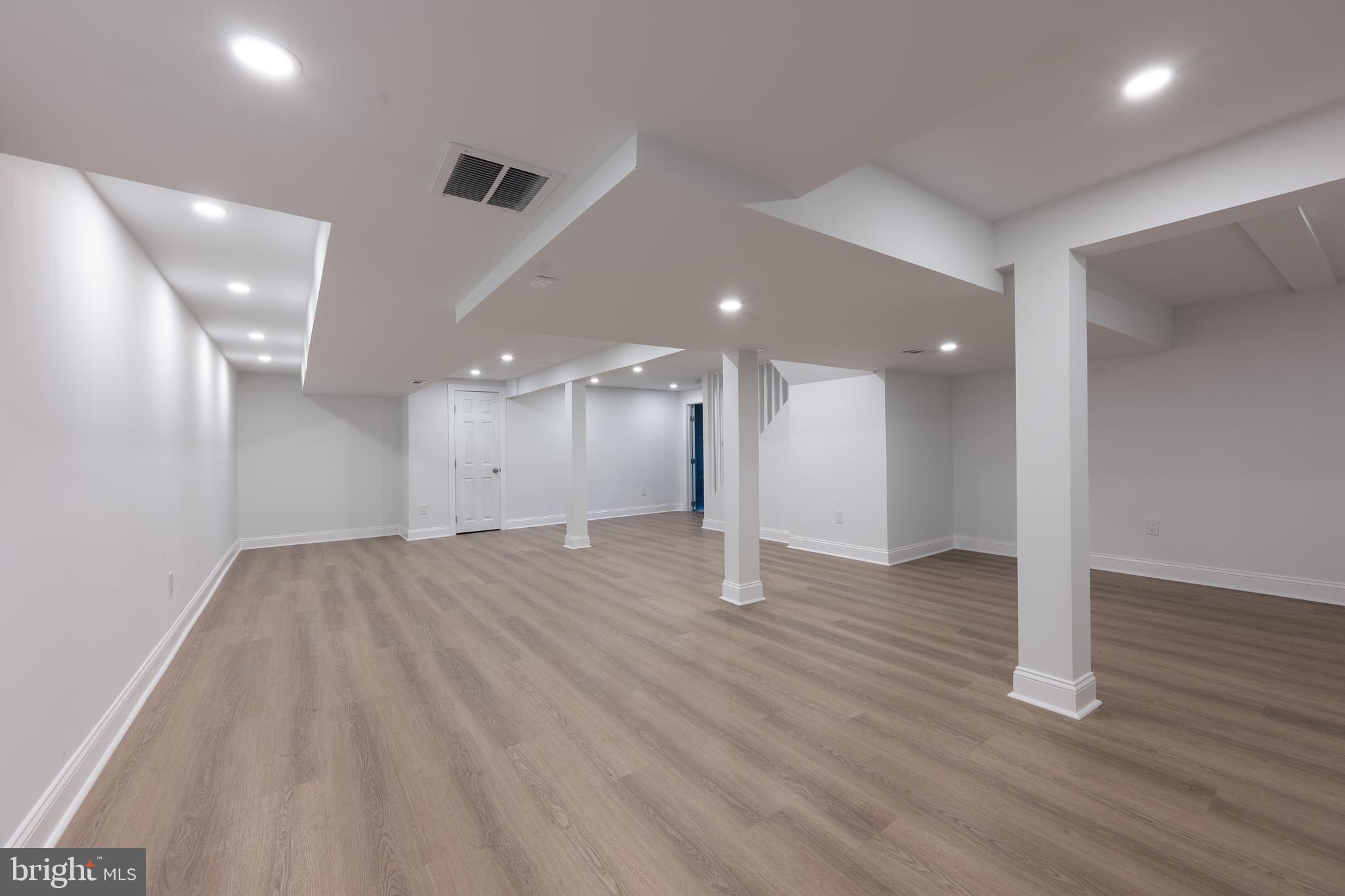 3 Slalom Court Pine Hill, NJ 08021 - Photo 35 of 47 an empty room with wooden floor and windows