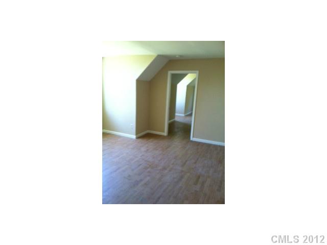 1400 Hall Road Mount Ulla, NC 28125 - Photo 10 of 13 a view of a room with wooden floor