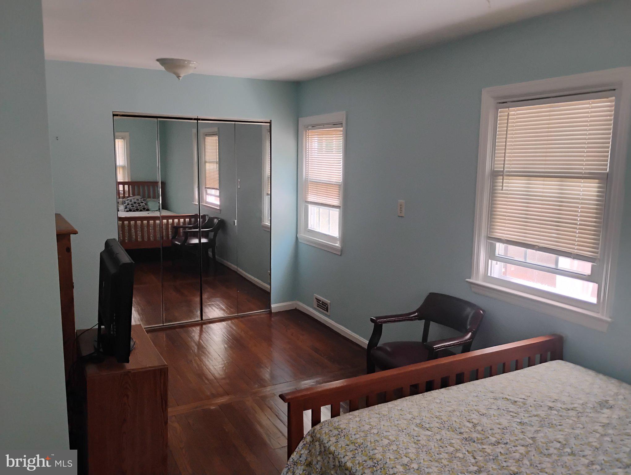 3908 Lantern Drive Silver Spring, MD 20902 - Photo 7 of 15 a living room with furniture and a window