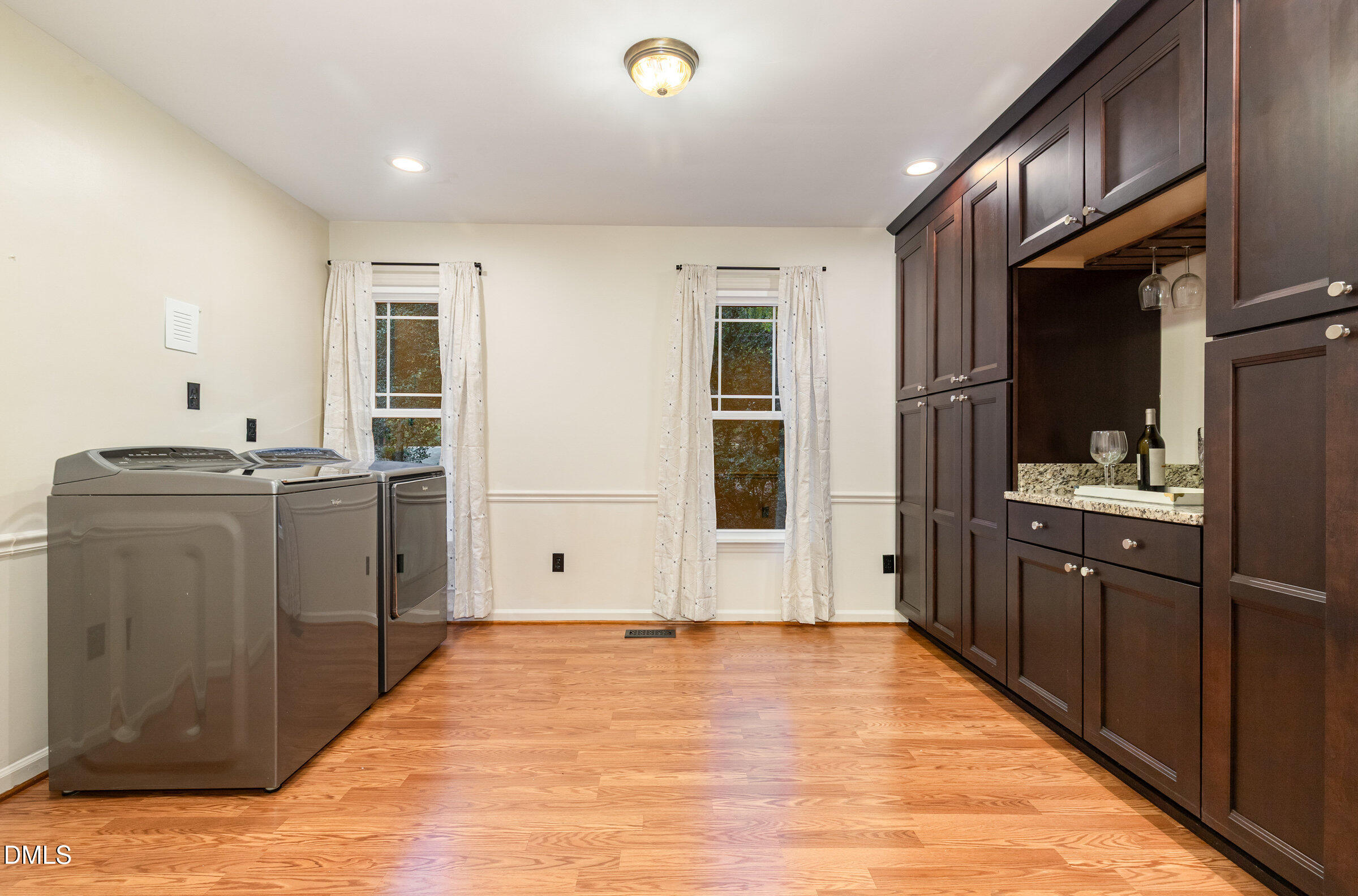 12413 Hardee Road Raleigh, NC 27614 - Photo 19 of 63 a view of a kitchen with a sink and dishwasher refrigerator freezer