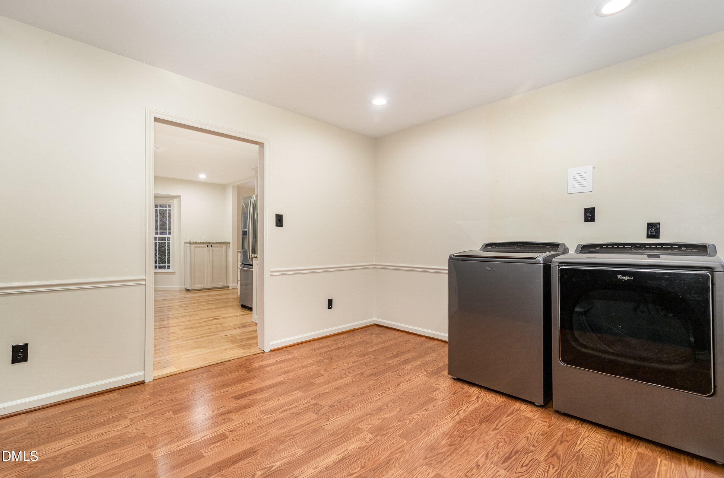 12413 Hardee Road Raleigh, NC 27614 - Photo 20 of 63 a view of a kitchen with a stove wooden cabinets and entryway
