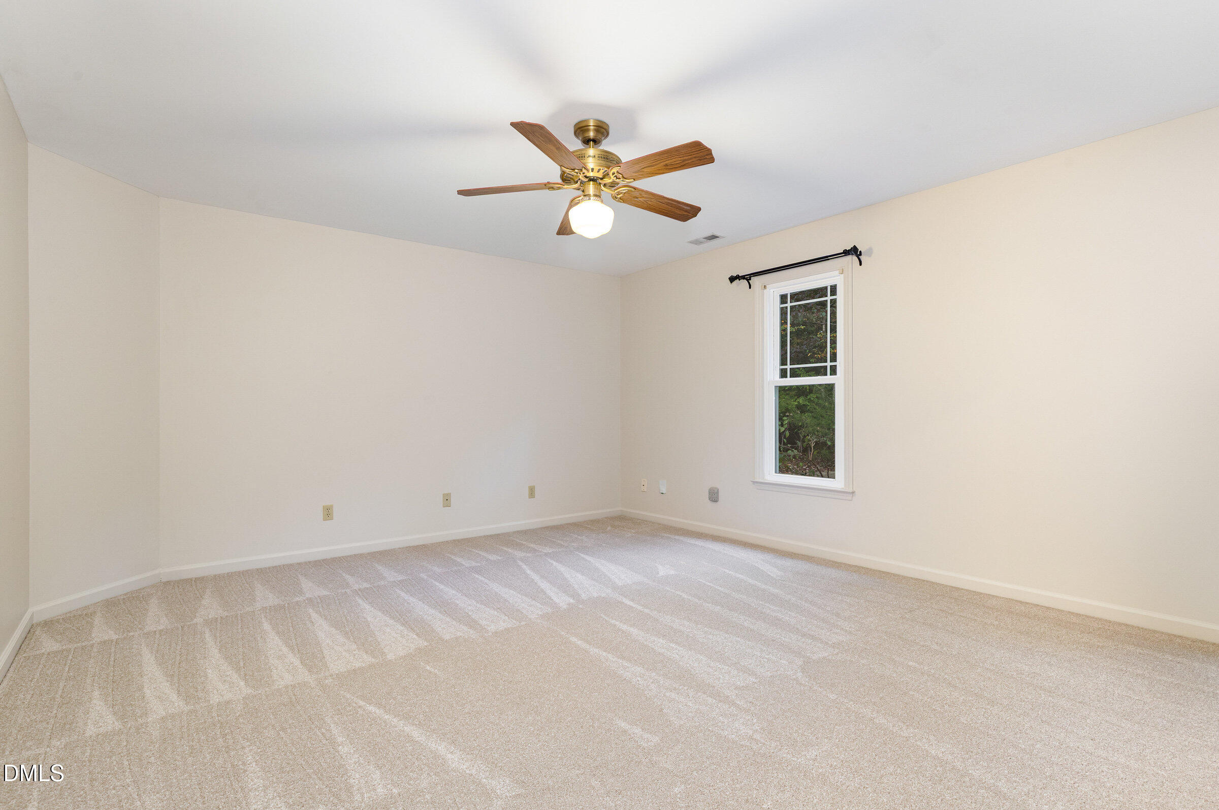 12413 Hardee Road Raleigh, NC 27614 - Photo 30 of 63 an empty room with windows and fan