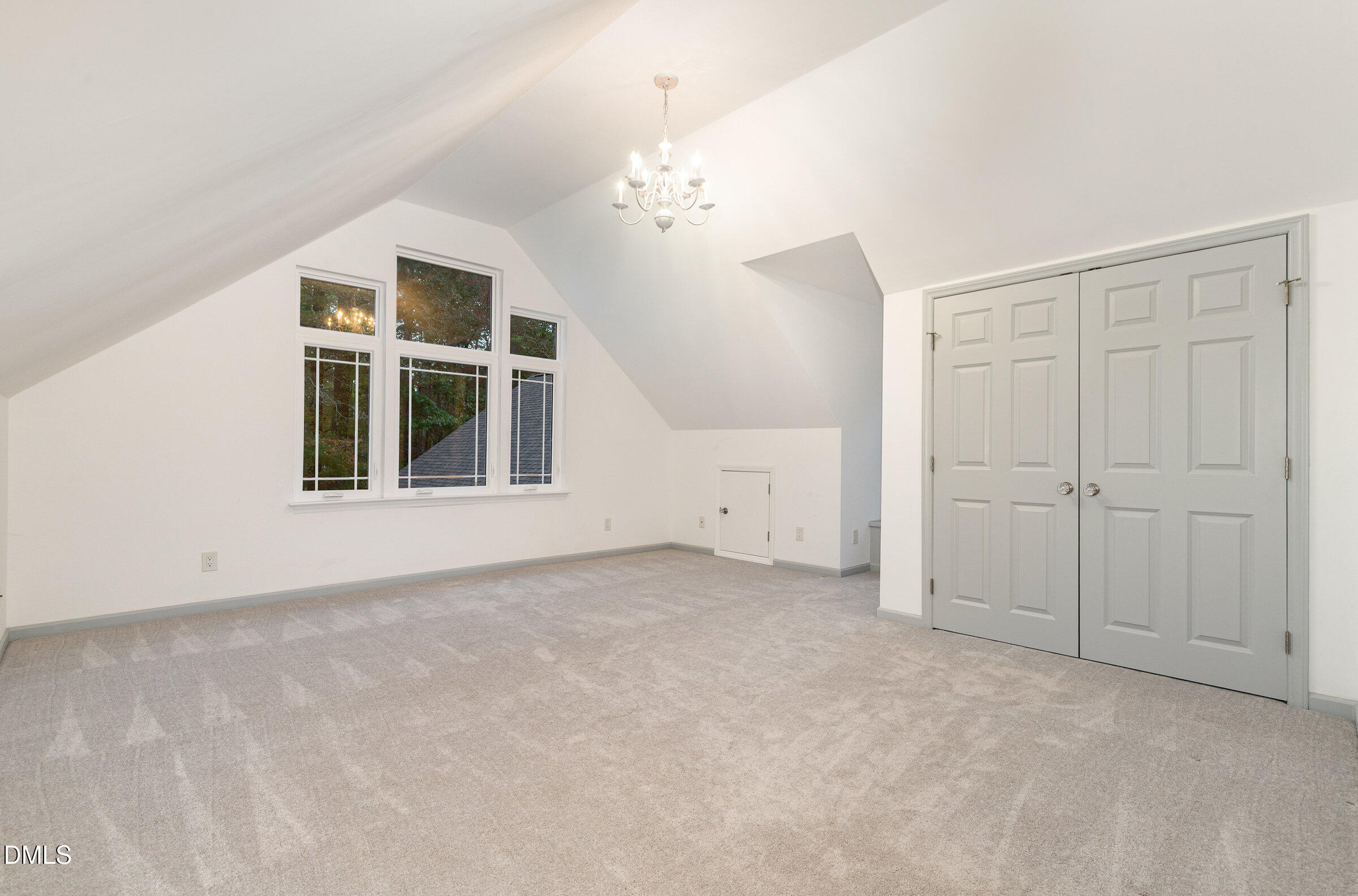 12413 Hardee Road Raleigh, NC 27614 - Photo 35 of 63 a view of an empty room with chandelier fan