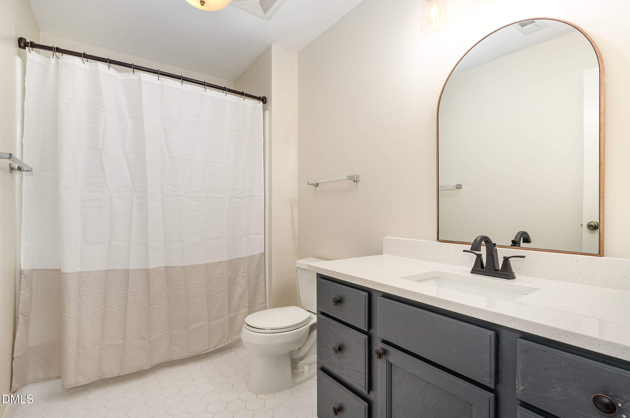 12413 Hardee Road Raleigh, NC 27614 - Photo 38 of 63 a bathroom with a sink and a mirror