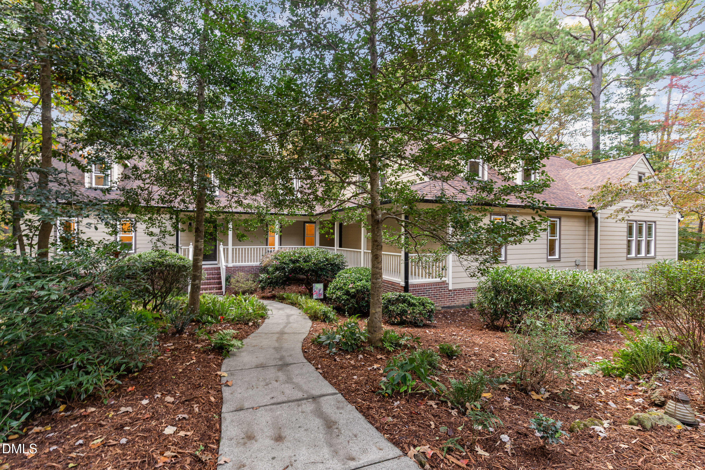 12413 Hardee Road Raleigh, NC 27614 - Photo 3 of 63 a front view of a house with garden and porch
