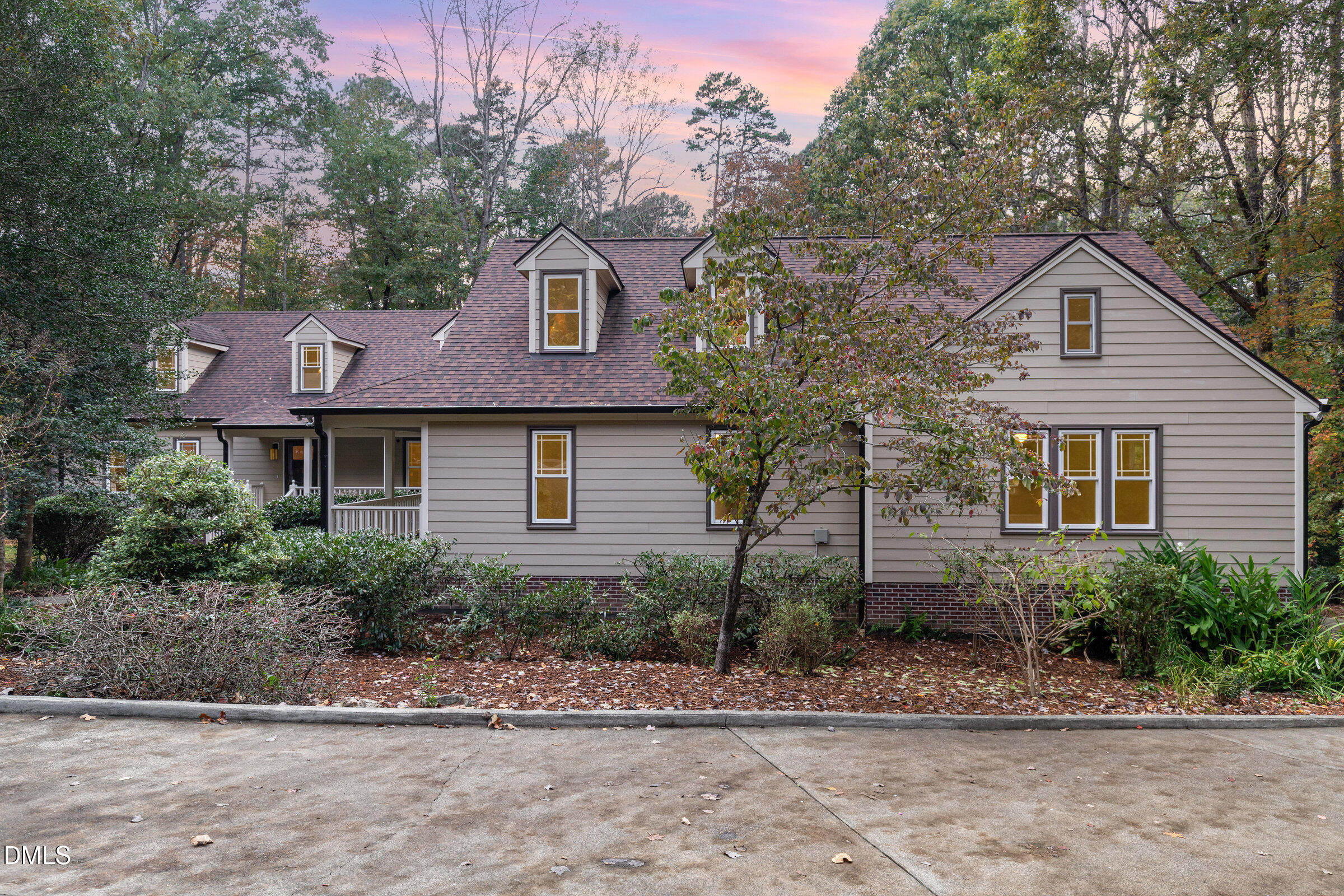 12413 Hardee Road Raleigh, NC 27614 - Photo 50 of 63 a front view of a house with a yard and garage