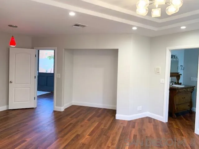 827 Mountain View Road El Cajon, CA 92021 - Photo 26 of 58 a view of livingroom with hardwood floor and a kitchen space