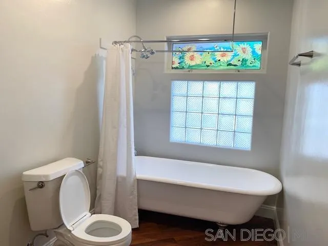 827 Mountain View Road El Cajon, CA 92021 - Photo 27 of 58 a bathroom with a sink toilet and window