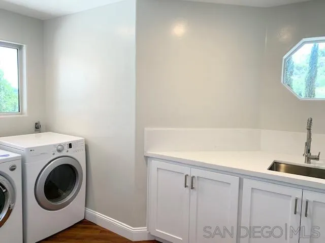 827 Mountain View Road El Cajon, CA 92021 - Photo 35 of 58 a utility room with dryer and washer