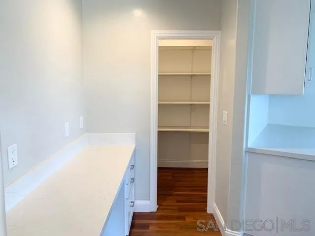 827 Mountain View Road El Cajon, CA 92021 - Photo 36 of 58 a view of a hallway with wooden floor and entryway