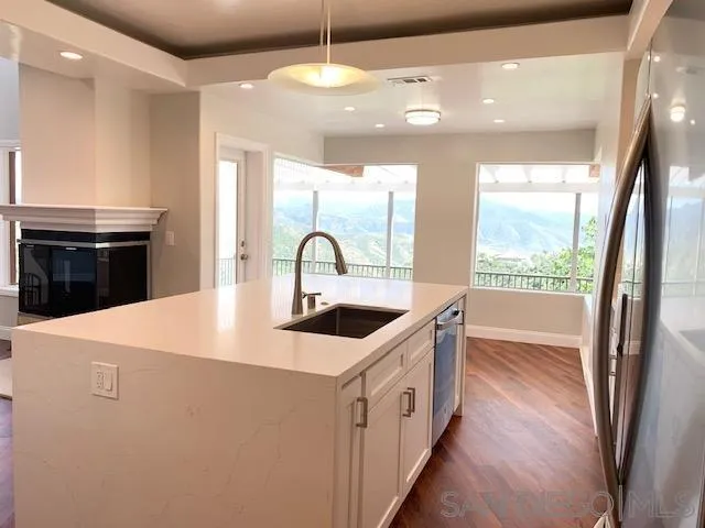 827 Mountain View Road El Cajon, CA 92021 - Photo 7 of 58 a kitchen with stainless steel appliances a sink and a stove