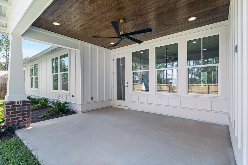 100 Grizzly Street Freeport, FL 32439 - Photo 48 of 65 a view of an empty room with a window and balcony